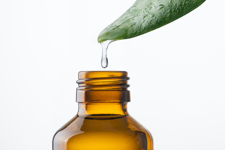 An essential oil with a leaf