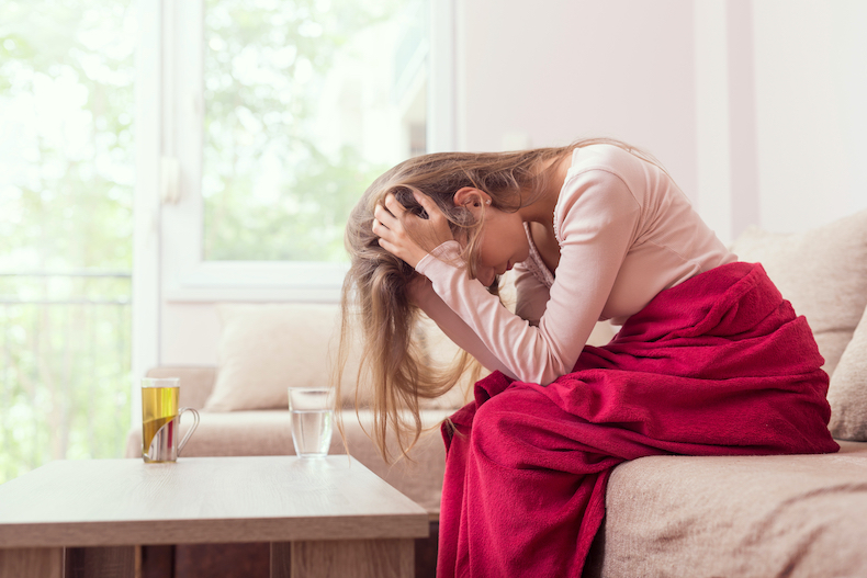 A woman sitting on a couch